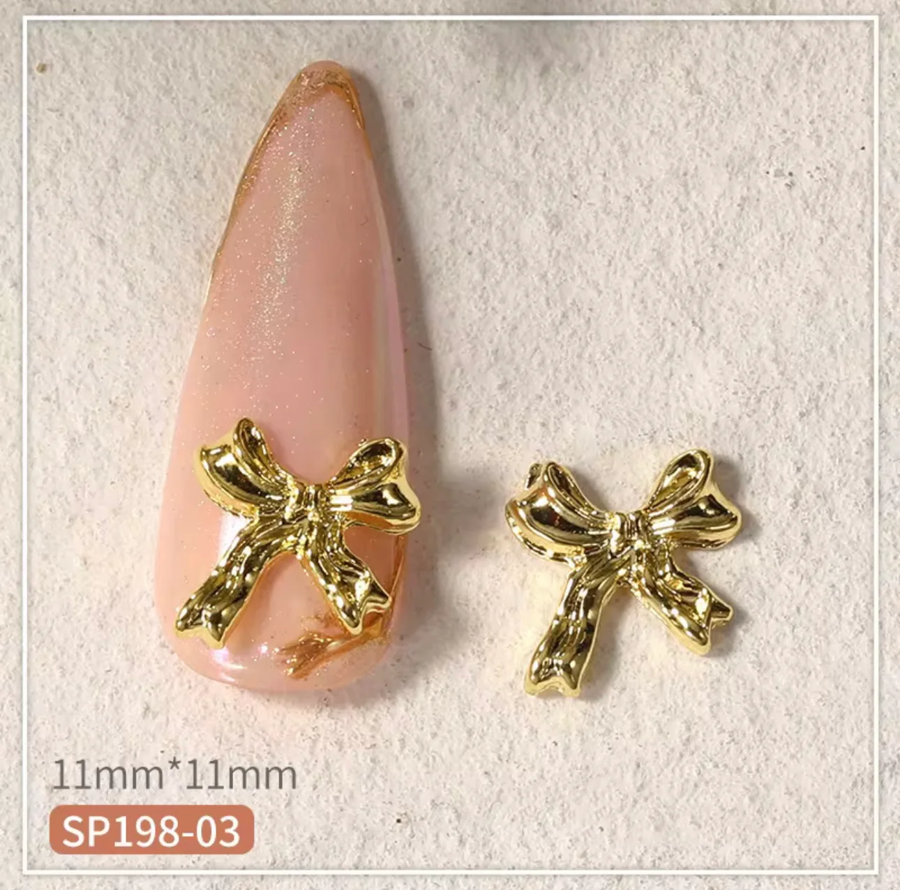 Bow Nail Charm